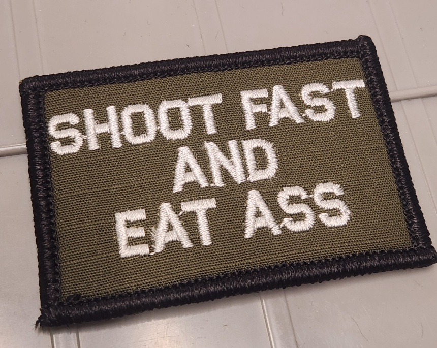 ASOS - Shoot Fast And Eat Ass - 2x3 Patch - Olive Drab w/White