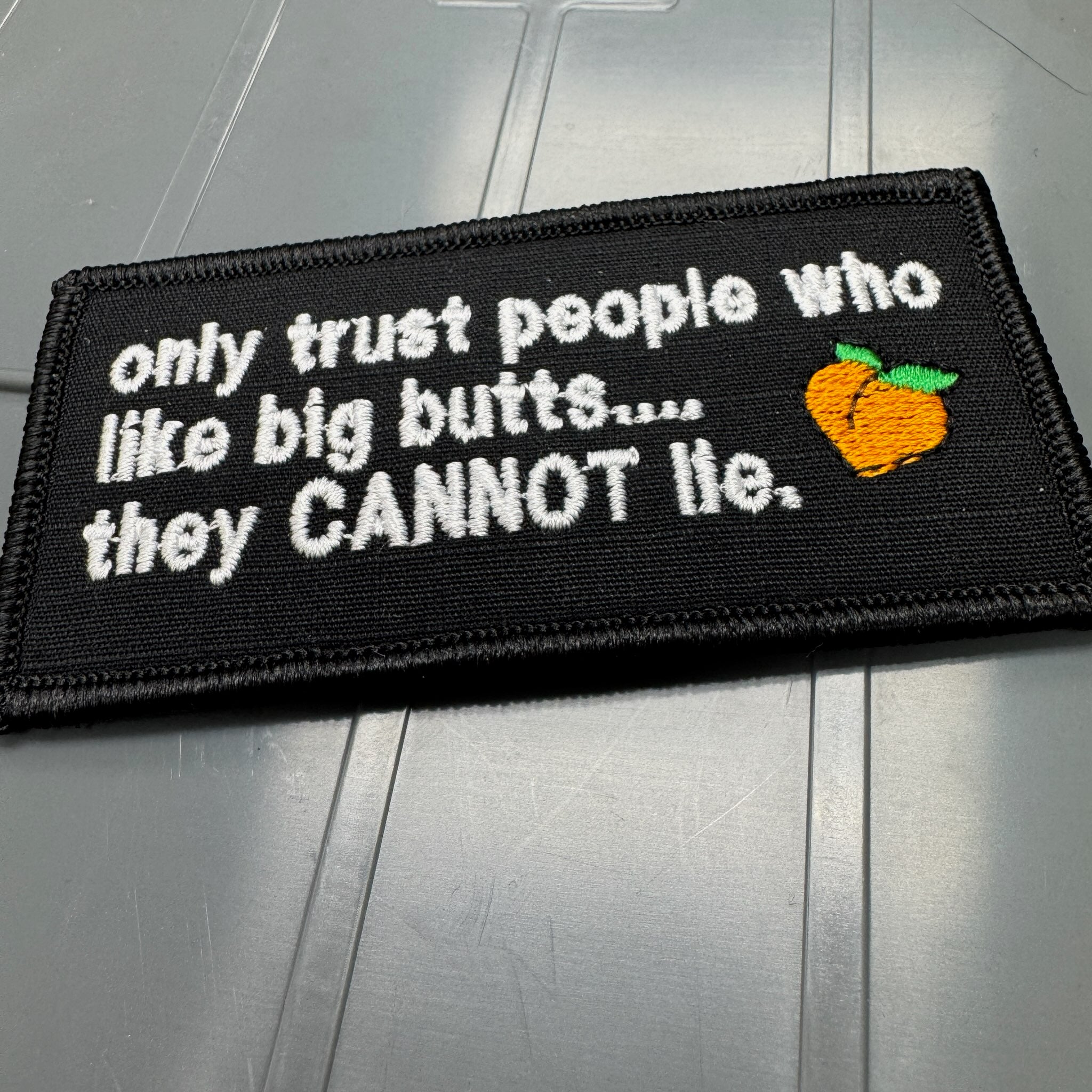 As Seen on Socials - only trust people who like big butts.... they CANNOT lie. - 2x4 Patch - Black w/Silver
