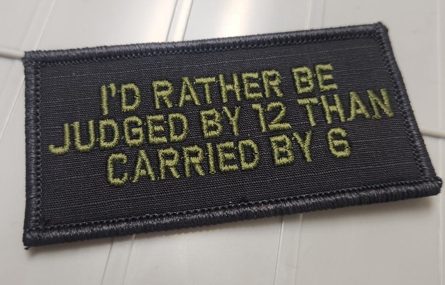 As Seen on Socials - I'd Rather Be Judged By 12 Than Carried By 6 - 2x4 Patch - Black w/OD